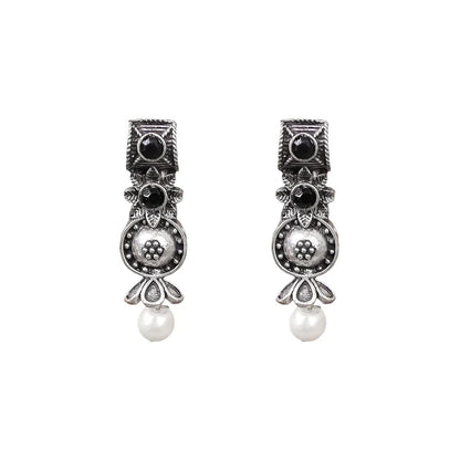 Peacock glow stone studded dangler earrings (White) Wonderful wildflower oxidised stud earrings (Black) Combo set