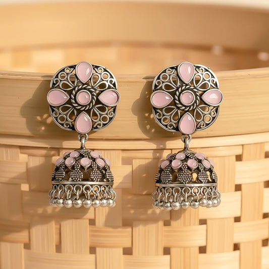 Oxidised Floral Jhumka earring with Baby pink stone detailing.