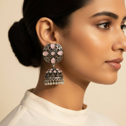 Oxidised Floral Jhumka earring with Baby pink stone detailing.