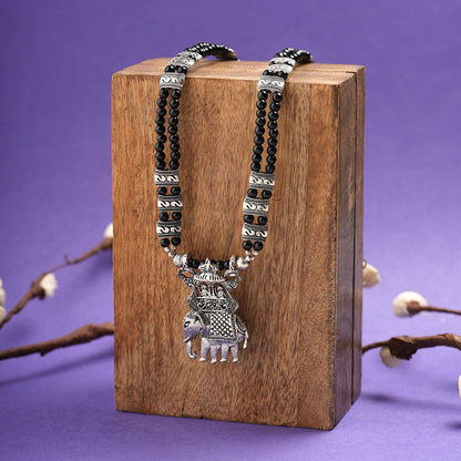 Tusker Tale statement pendant beaded neckpiece (Black)
