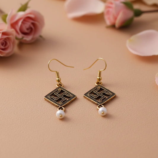 Swastik shaped dangler earrings