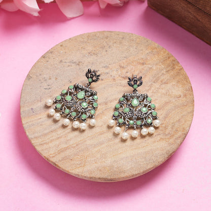 Peacock glow stone studded dangler earrings (Pista)