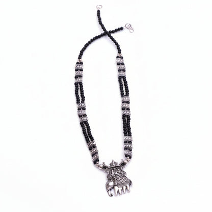 Tusker Tale statement pendant beaded neckpiece (Black)