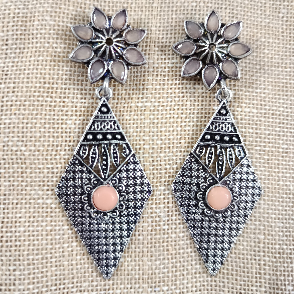 Kite delight stone studded dangler earrings (Light Orange)
